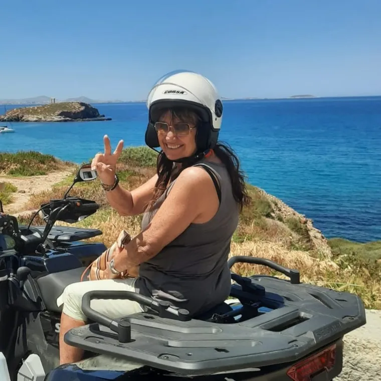 Quad parked on a coastal cliff overlooking the Aegean Sea
